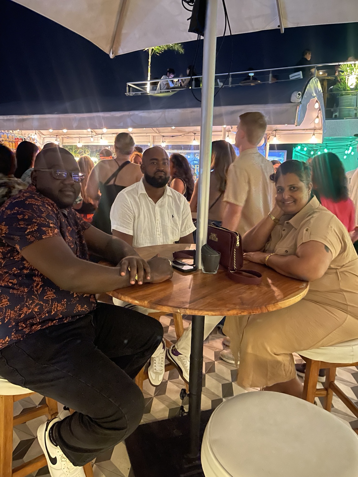 Three clients enjoying the rooftop at Casa Casco